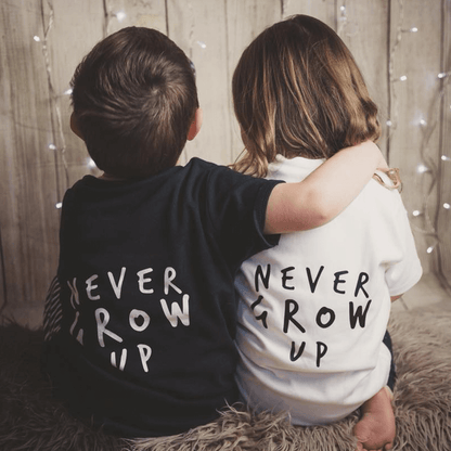 Never Grow Up Unisex Short Sleeve Kids T-Shirt