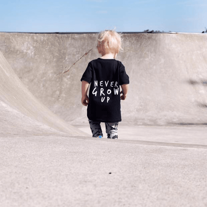 Never Grow Up Unisex Short Sleeve Baby T-Shirt