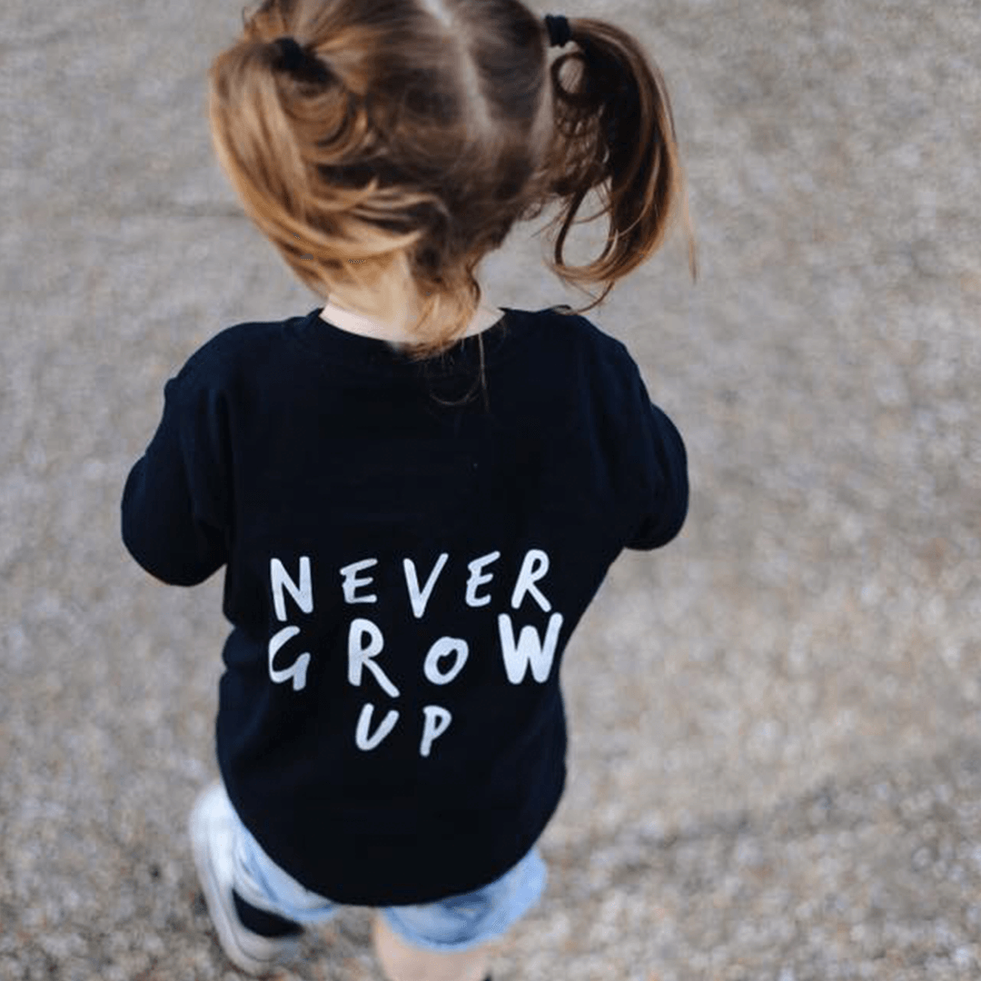 Never Grow Up Unisex Short Sleeve Baby T-Shirt