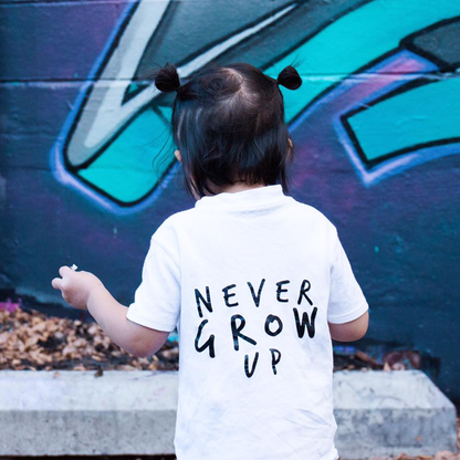 Never Grow Up Unisex Short Sleeve Kids T-Shirt