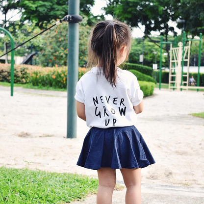 Never Grow Up Unisex Short Sleeve Kids T-Shirt