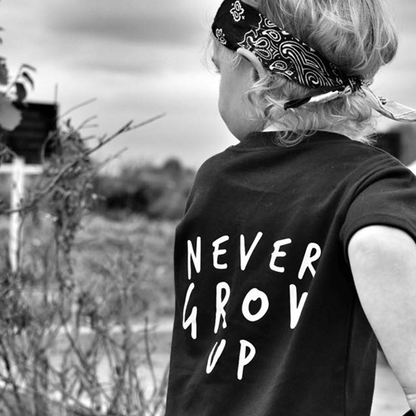 Never Grow Up Unisex Short Sleeve Kids T-Shirt